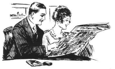 couplereadingpaper.jpg (31607 bytes)